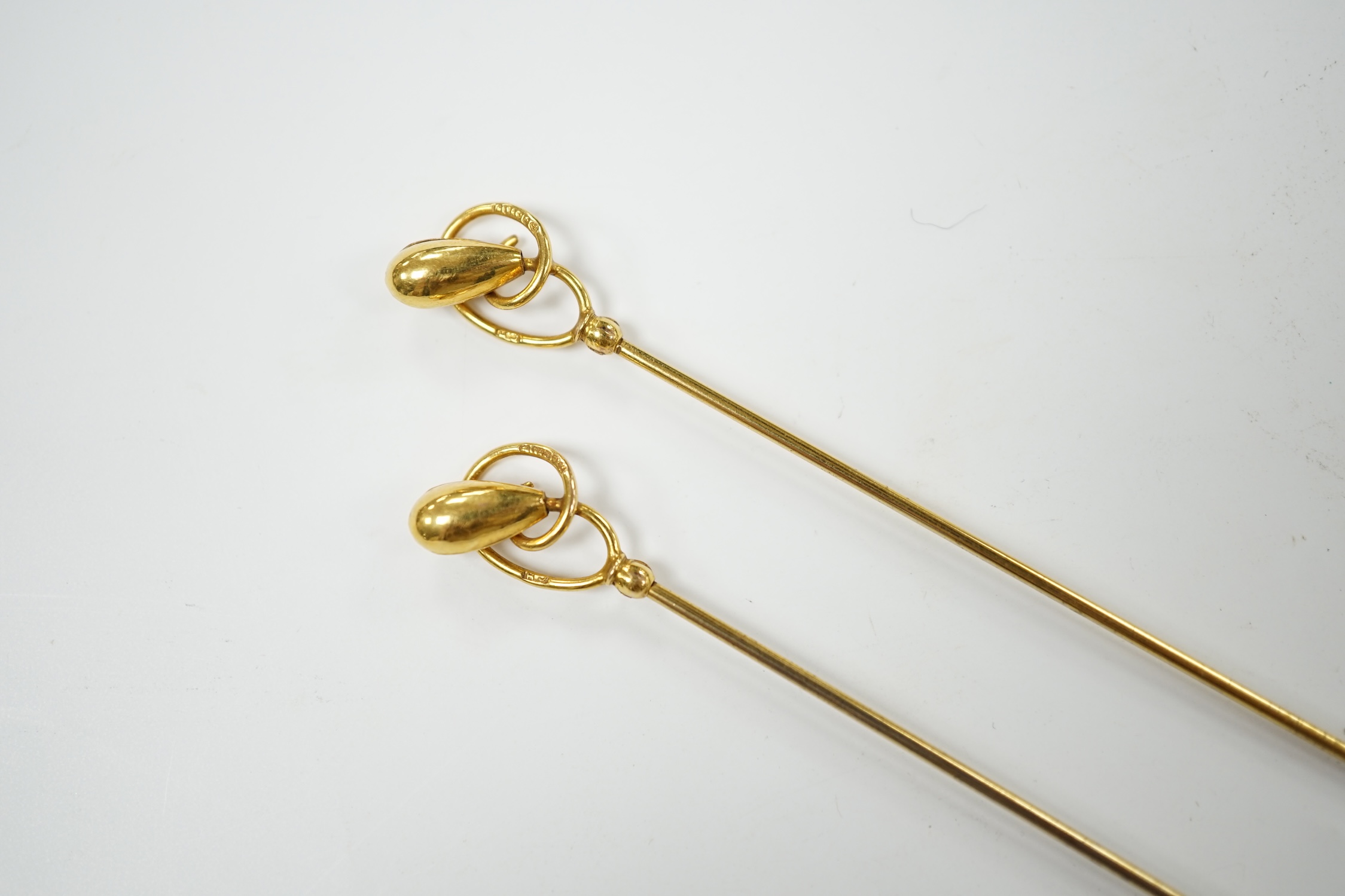 A pair of George V 9ct gold hat pins by Charles Horner, 31.1cm, 4.8 grams. Condition - good